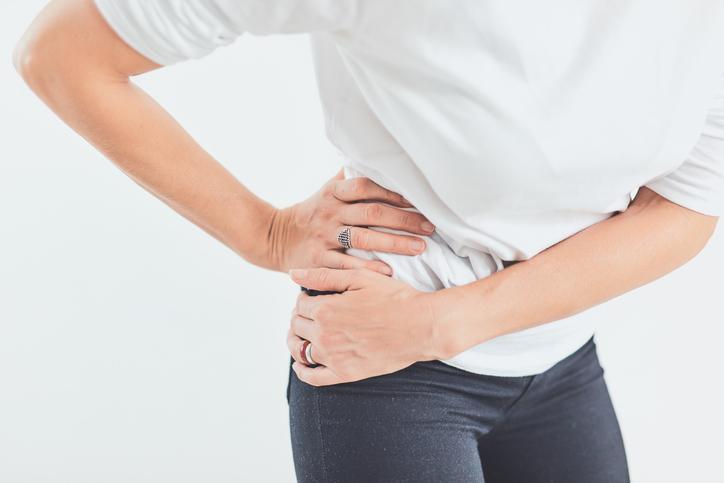 Female having painful hip Female having painful hip