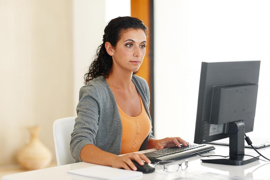 Female working on laptop at home