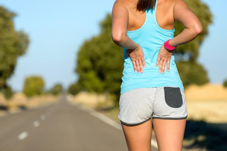 Back pain Girl getting back pain while running