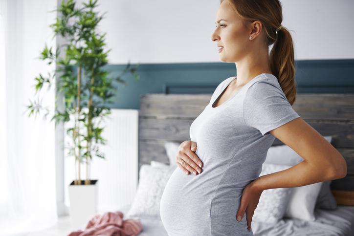 Pregnancy related back pain Pregnancy woman getting back pain