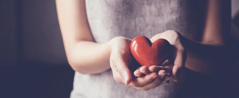 Woman holding hearts